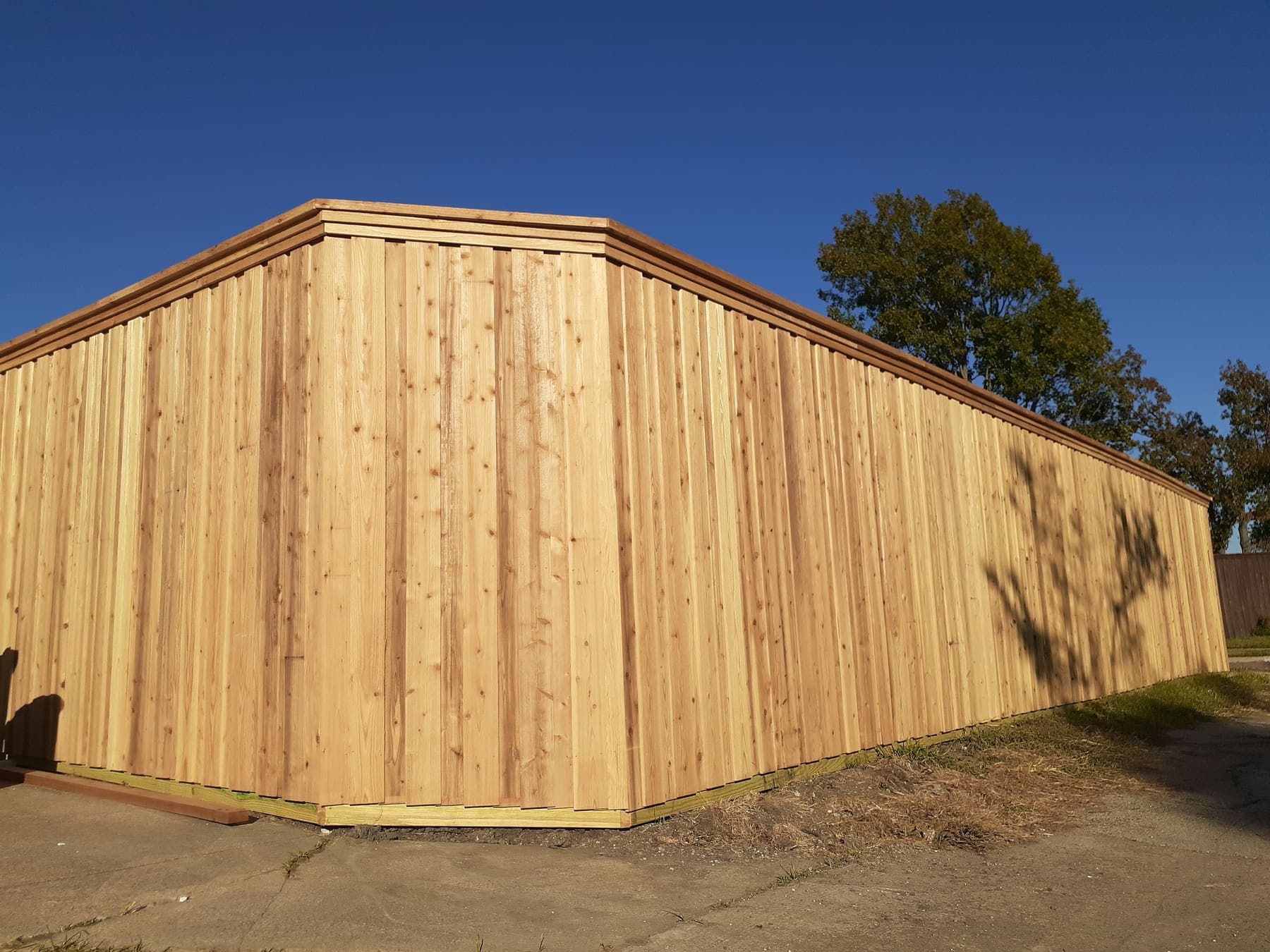 Horizontal cedar fence with full-cap trim — Woodchuck Millwork installation in Allen, TX